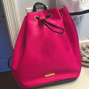Hot pink leather juicy couture back back bag with free pouch